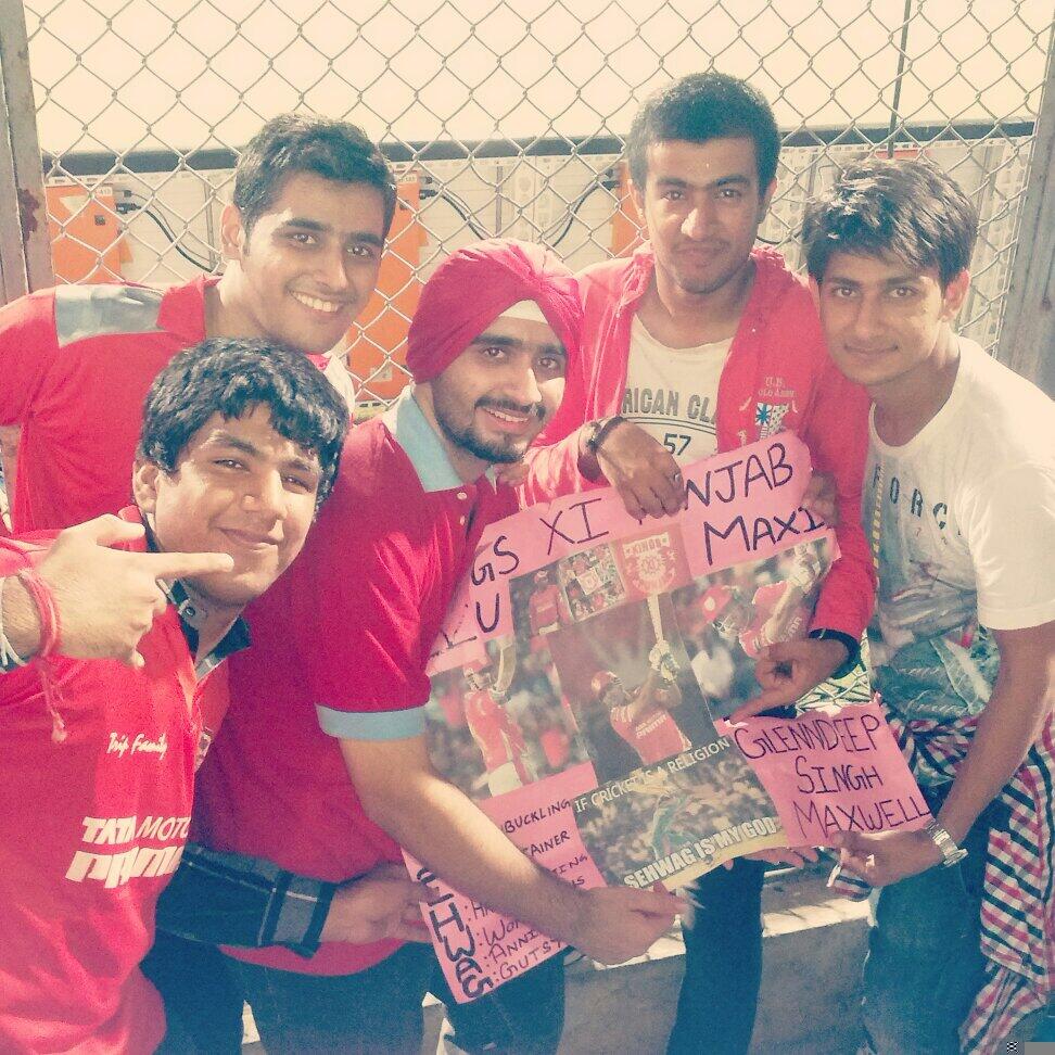 At the Wankhede stadium, wearing a red turban, celebrating Sehwag's century, and Kings XI Punjab's entry into the IPL finals